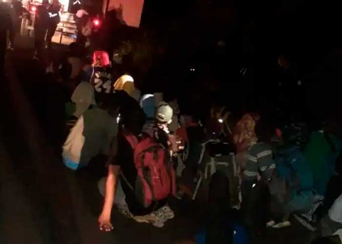 126 migrantes abandonados dentro de un contenedor en Escuintla, Guatemala