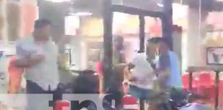 Pleito entre dos hombres en una gasolinera de Managua