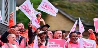 Miles de trabajadores en huelga por aumento salarial en Reino Unido