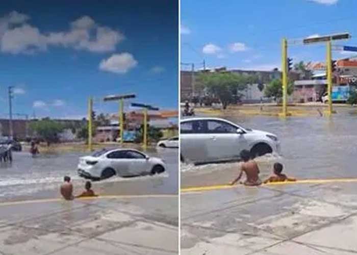 ¡Qué finos! Captan a niños dándose un “chapuzón” en calle inundada