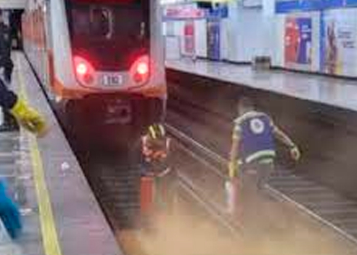 Hombre celoso se tiró con su pajera en las vías del tren en México