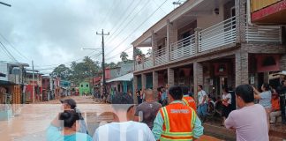 Foto: Autoridades y población se activan para la limpieza tras una hora de lluvias intensas que provocaron inundaciones en Santo Domingo/TN8