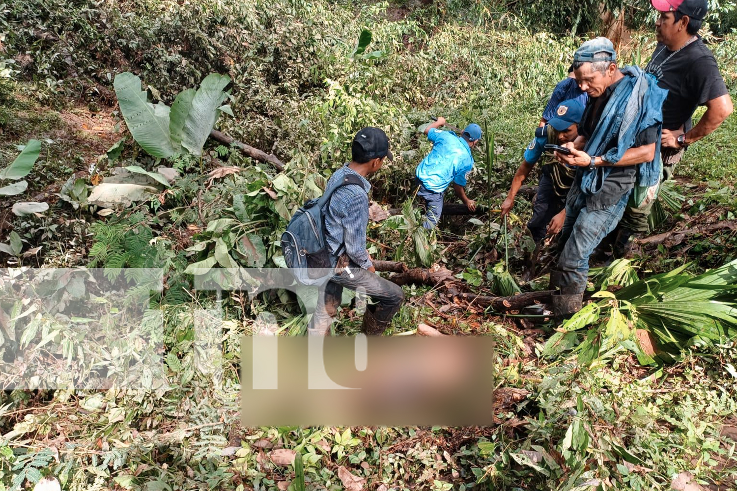 Foto: los cuerpecitos de las dos pequeñas que fueron arrastradas por las fuertes corrientes del río Kamusaska, Chontales/TN8