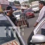 Foto: Pleito de taxistas en el Mercado Oriental, popular mercado en Managua, Nicaragua / TN8