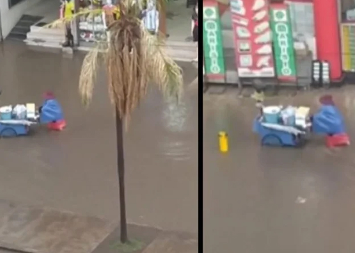 Foto: Abuelita trabaja bajo la lluvia /cortesía 